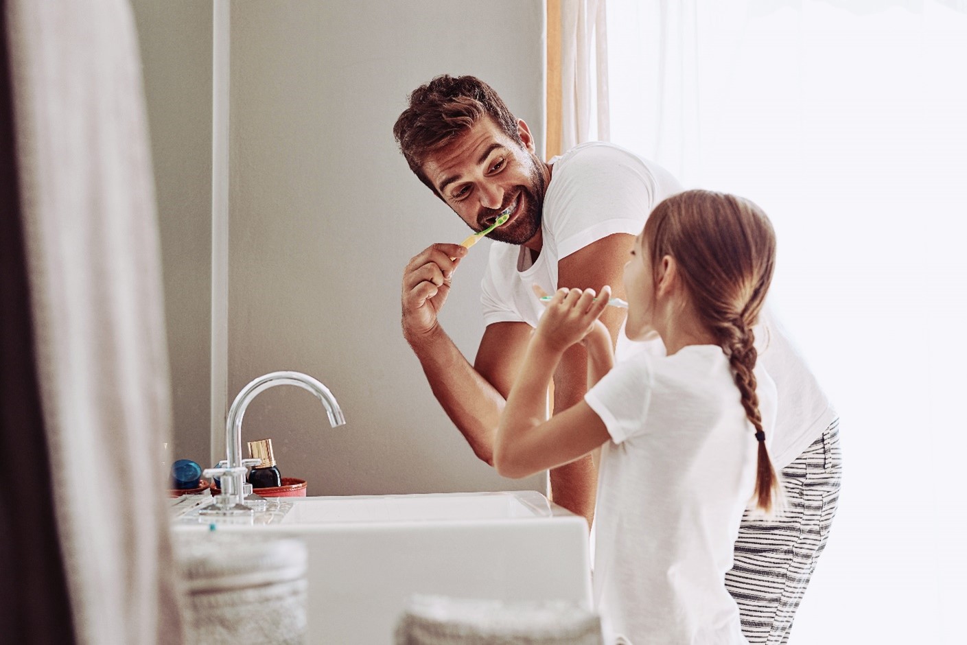 A dental professional providing careful patient treatment